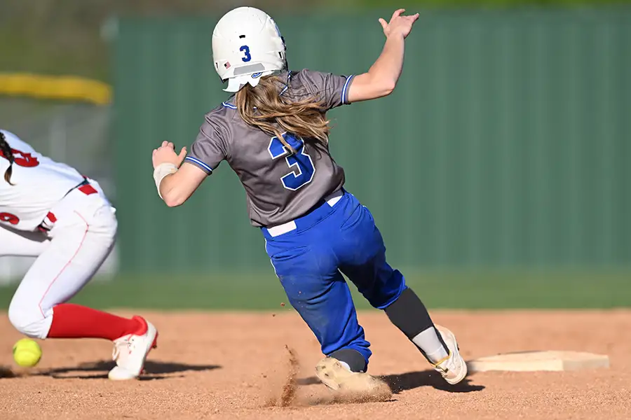 Girl playing softball